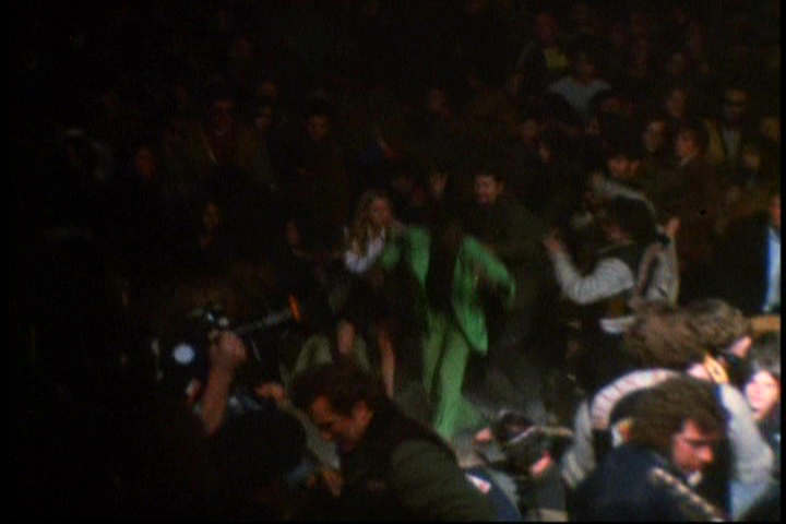 Angels surge toward Hunter, who makes no attempt to defend himself with his imaginary gun
